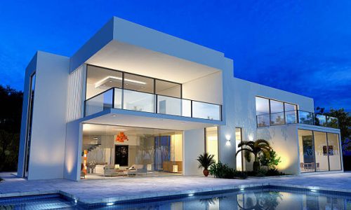 luxurious villa with swimming pool at dusk